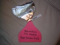 CONSTRUCTION PAPER AND ALUMINUM FOIL KISS